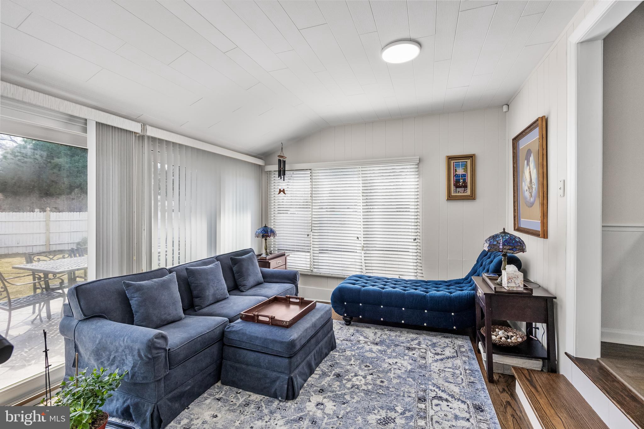 702 Heritage Road Cinnaminson, NJ 08077 - Photo 14 of 30 a living room with furniture rug and a large window