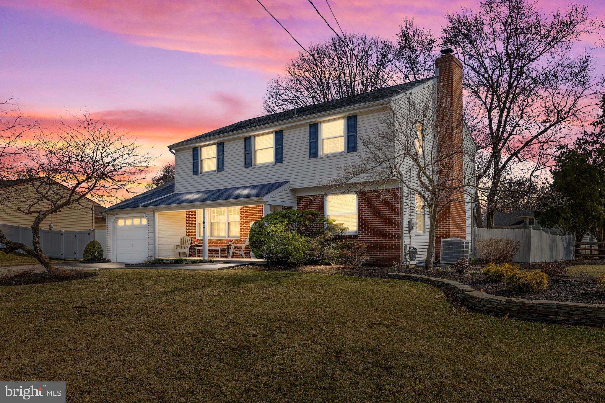702 Heritage Road Cinnaminson, NJ 08077 - Photo 30 of 30 a front view of a house with a yard and trees
