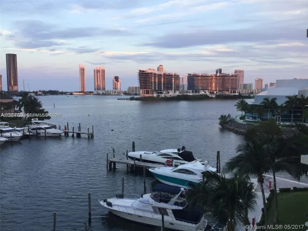 a view of a ocean with tall building