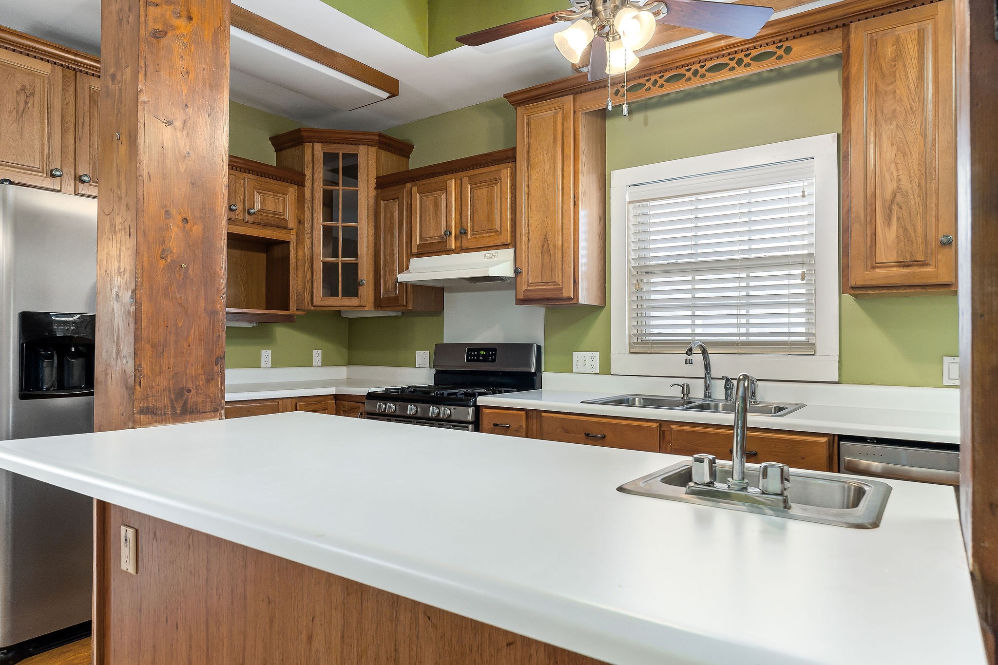 408 West Main Street Smithville, TN 37166 - Photo 25 of 81 a kitchen with stainless steel appliances granite countertop a sink and a stove