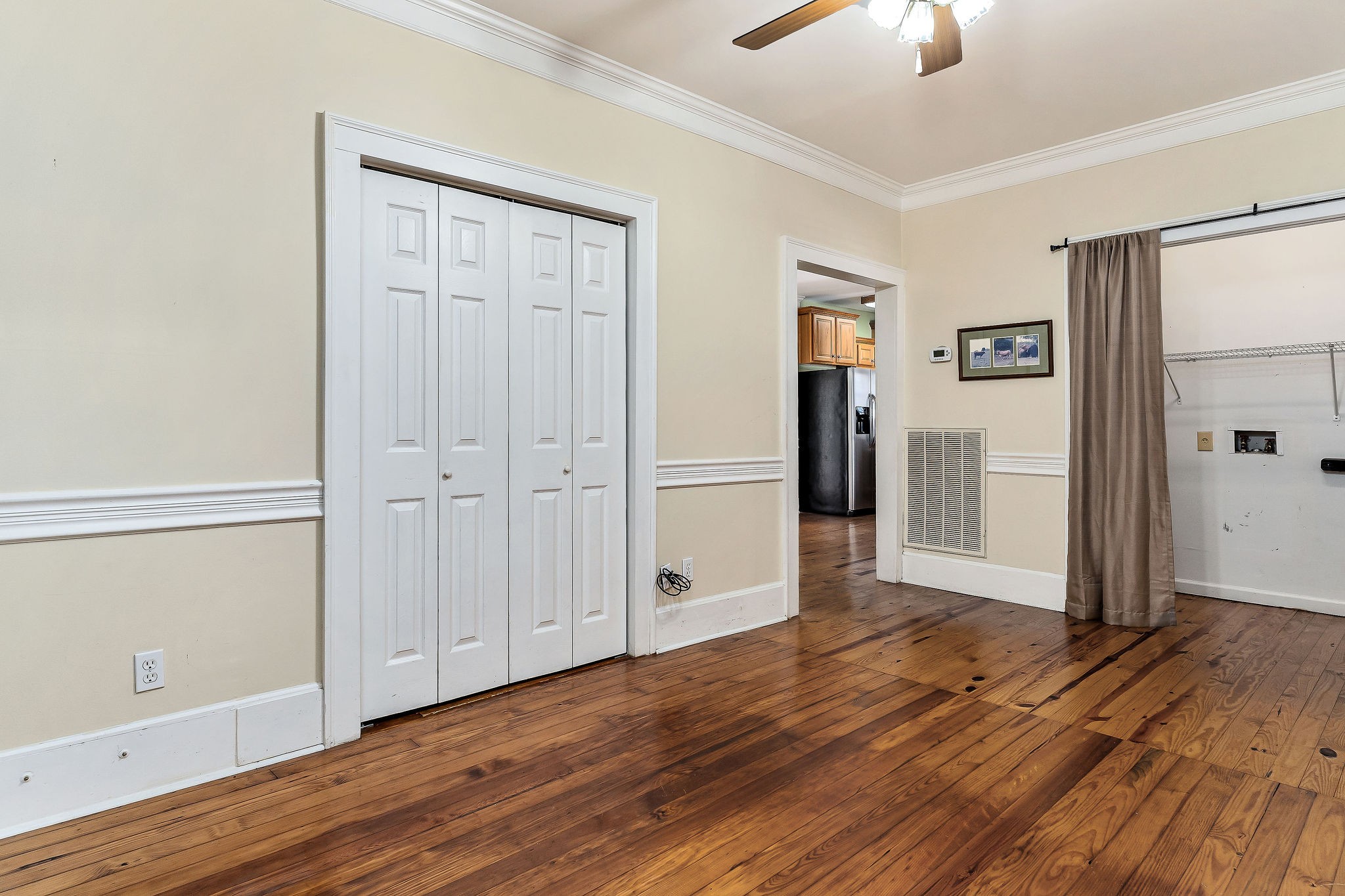 408 West Main Street Smithville, TN 37166 - Photo 29 of 81 an empty room with wooden floor cabinet and windows