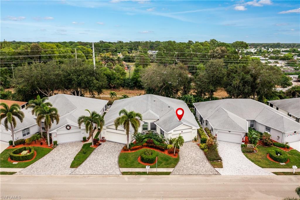 455 Crossfield Circle, Unit 71 Naples, FL 34104 - Photo 24 of 29 an aerial view of multiple house