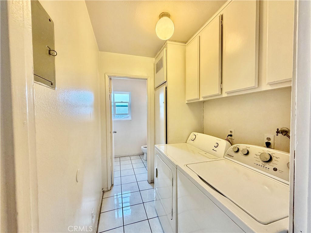 11216 Lower Azusa Road, Unit C El Monte, CA 91731 - Photo 16 of 28 a utility room with dryer and washer