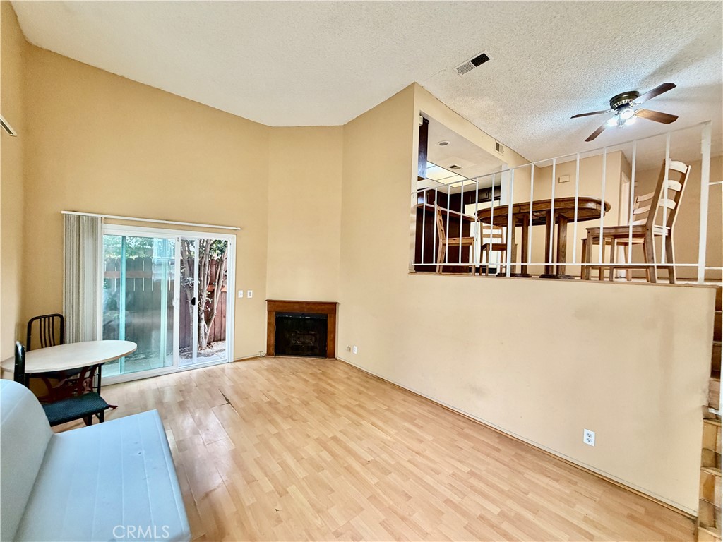 11216 Lower Azusa Road, Unit C El Monte, CA 91731 - Photo 7 of 28 a bedroom with furniture and a large window