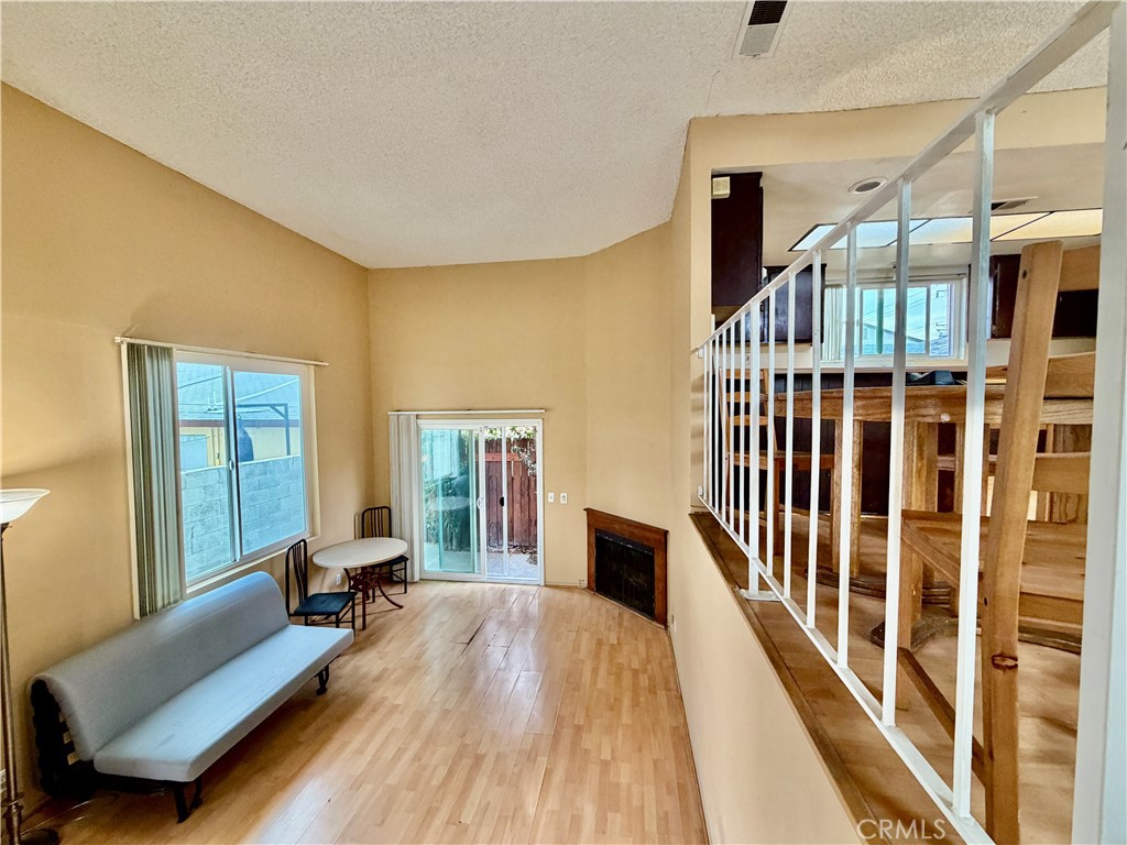11216 Lower Azusa Road, Unit C El Monte, CA 91731 - Photo 8 of 28 a living room with furniture and a large window
