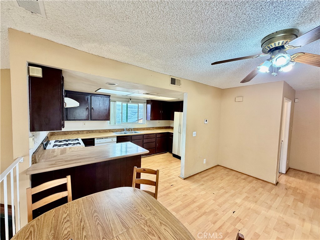 11216 Lower Azusa Road, Unit C El Monte, CA 91731 - Photo 10 of 28 a kitchen with a sink cabinets and appliances