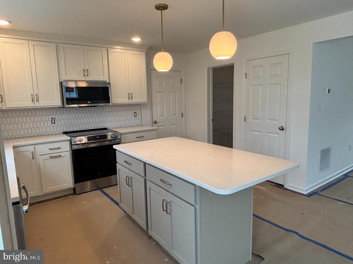 43 Old Orch Road Strasburg, PA 17579 - Photo 6 of 10 a kitchen that has a lot of cabinets in it