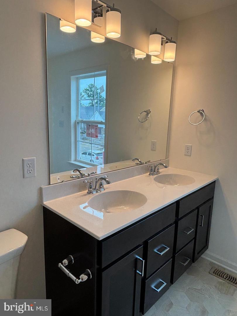 43 Old Orch Road Strasburg, PA 17579 - Photo 9 of 10 a bathroom with a sink and a mirror
