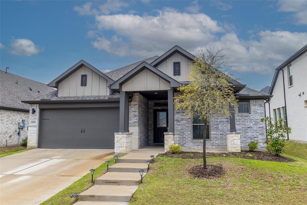 2601 Moser Lane Royse City, TX 75189 - Photo 1 of 35 a front view of a house with garden