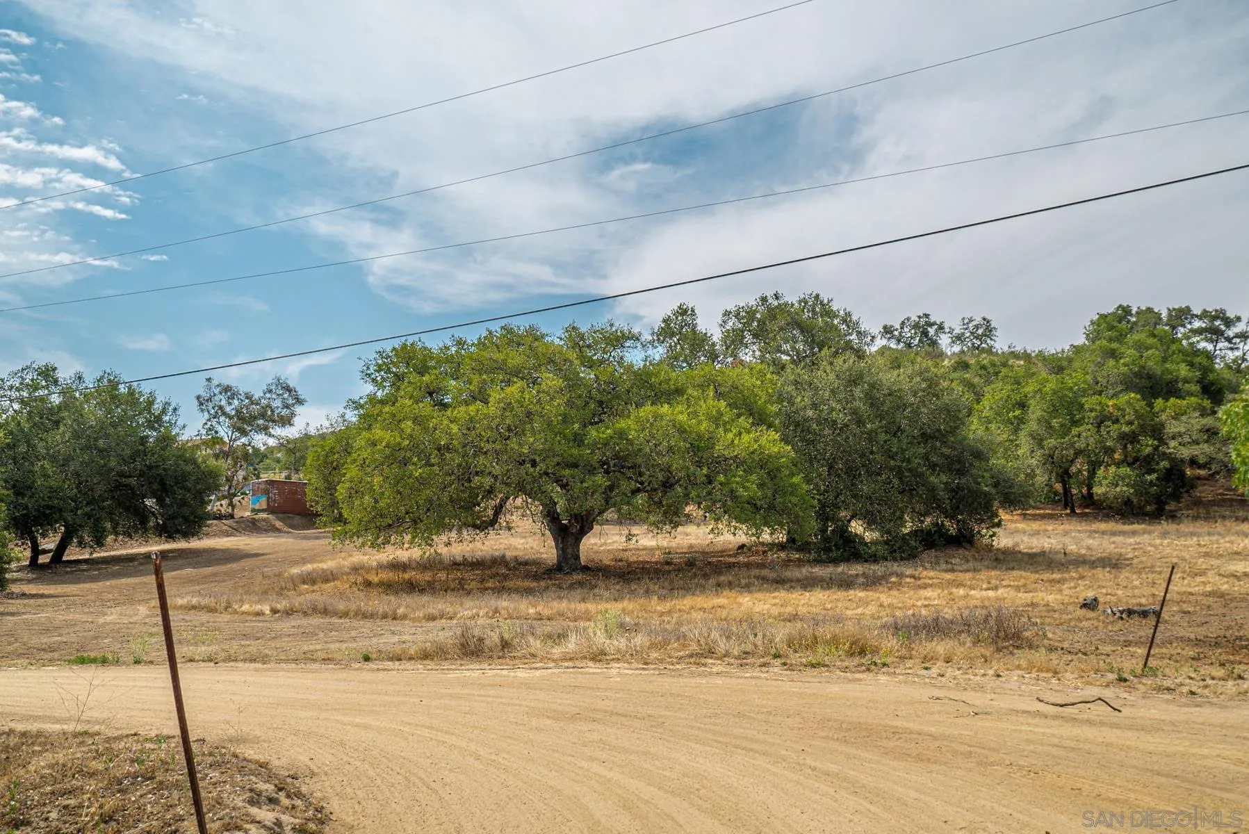 Paradise Mountain Rd Valley Center, Unit 1892302700 Valley Center, CA 92082 - Photo 24 of 24 a view of a yard with wooden fence
