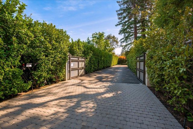 a view of a back yard with green space