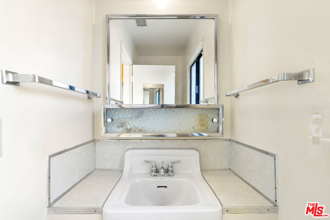 2118 Hilton Drive Burbank, CA 91504 - Photo 16 of 39 a bathroom with a bathtub and a sink