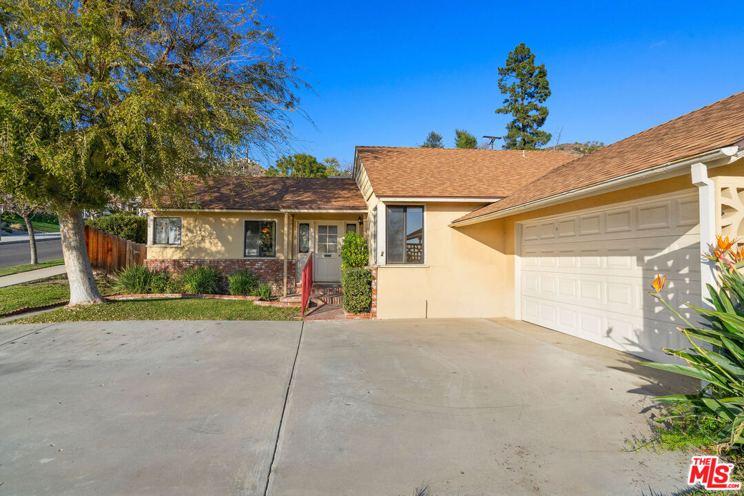 2118 Hilton Drive Burbank, CA 91504 - Photo 2 of 39 a view of a house with a yard and potted plants