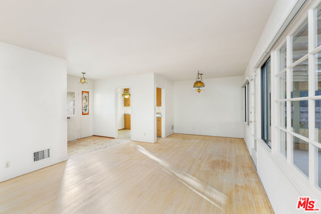 2118 Hilton Drive Burbank, CA 91504 - Photo 8 of 39 a view of empty room with wooden floor