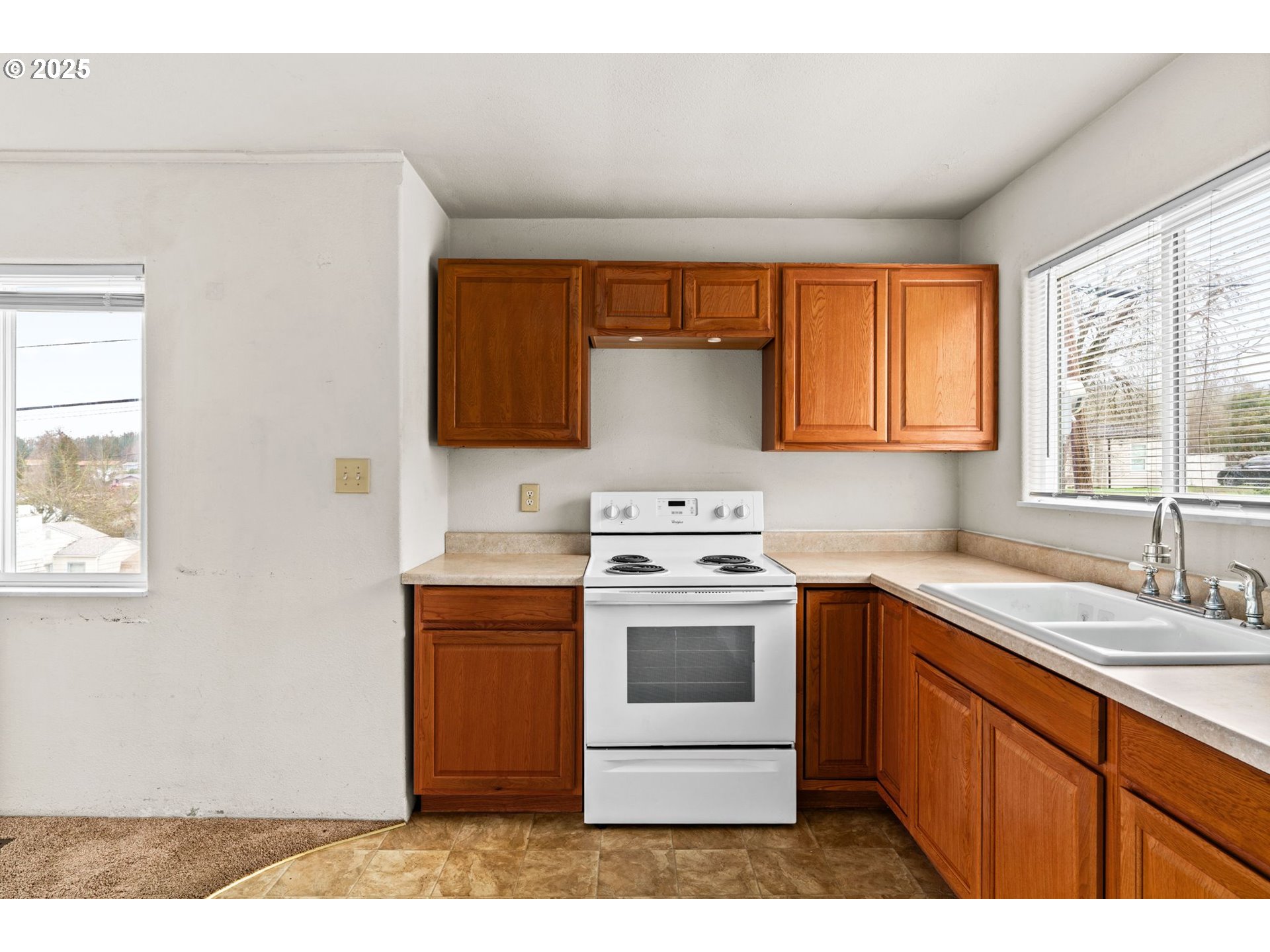 1389 Northeast Brooklyn Avenue Roseburg, OR 97470 - Photo 11 of 19 a kitchen with a sink stove and cabinets