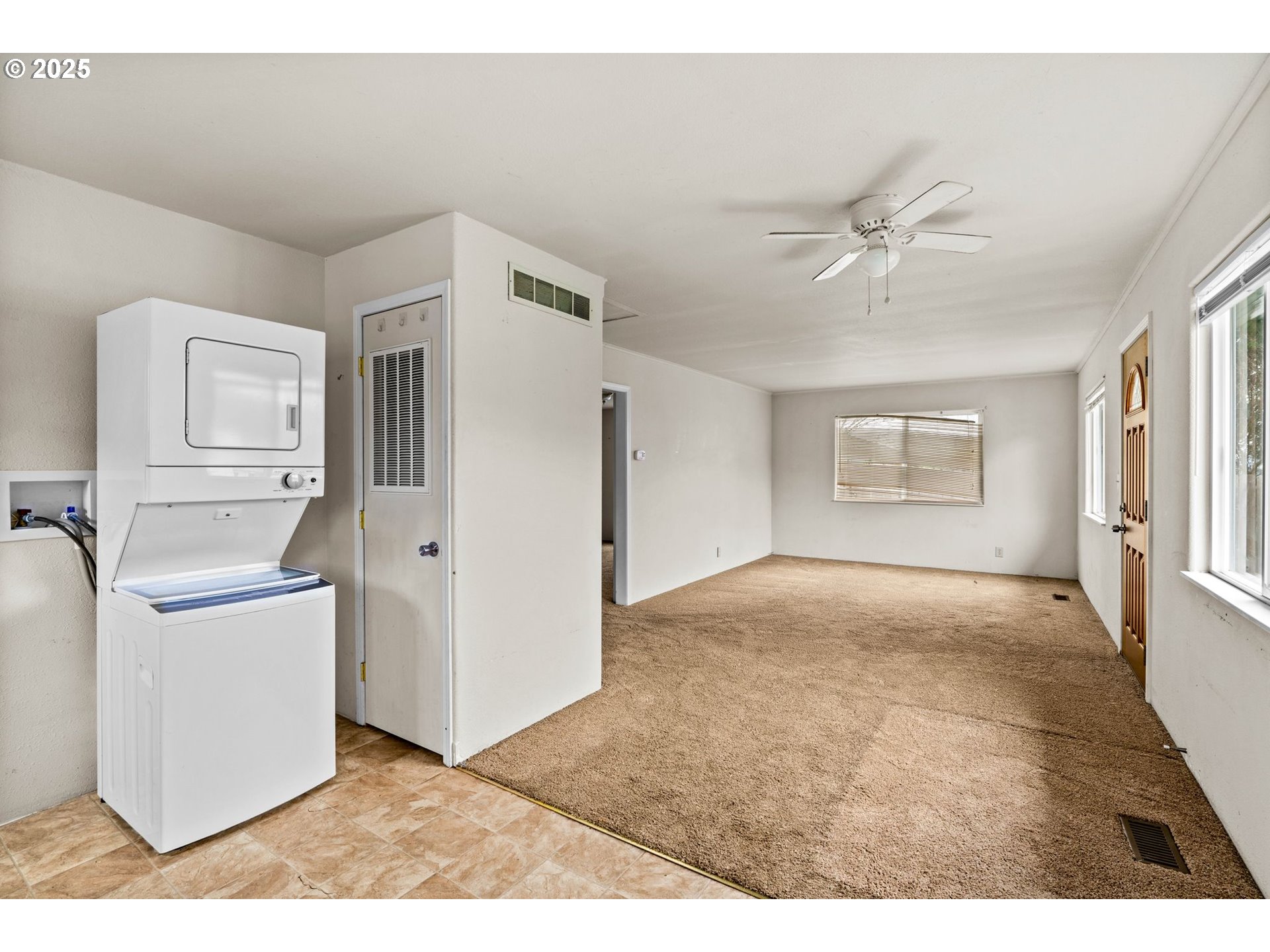 1389 Northeast Brooklyn Avenue Roseburg, OR 97470 - Photo 12 of 19 a view of a livingroom with a dishwasher and a refrigerator