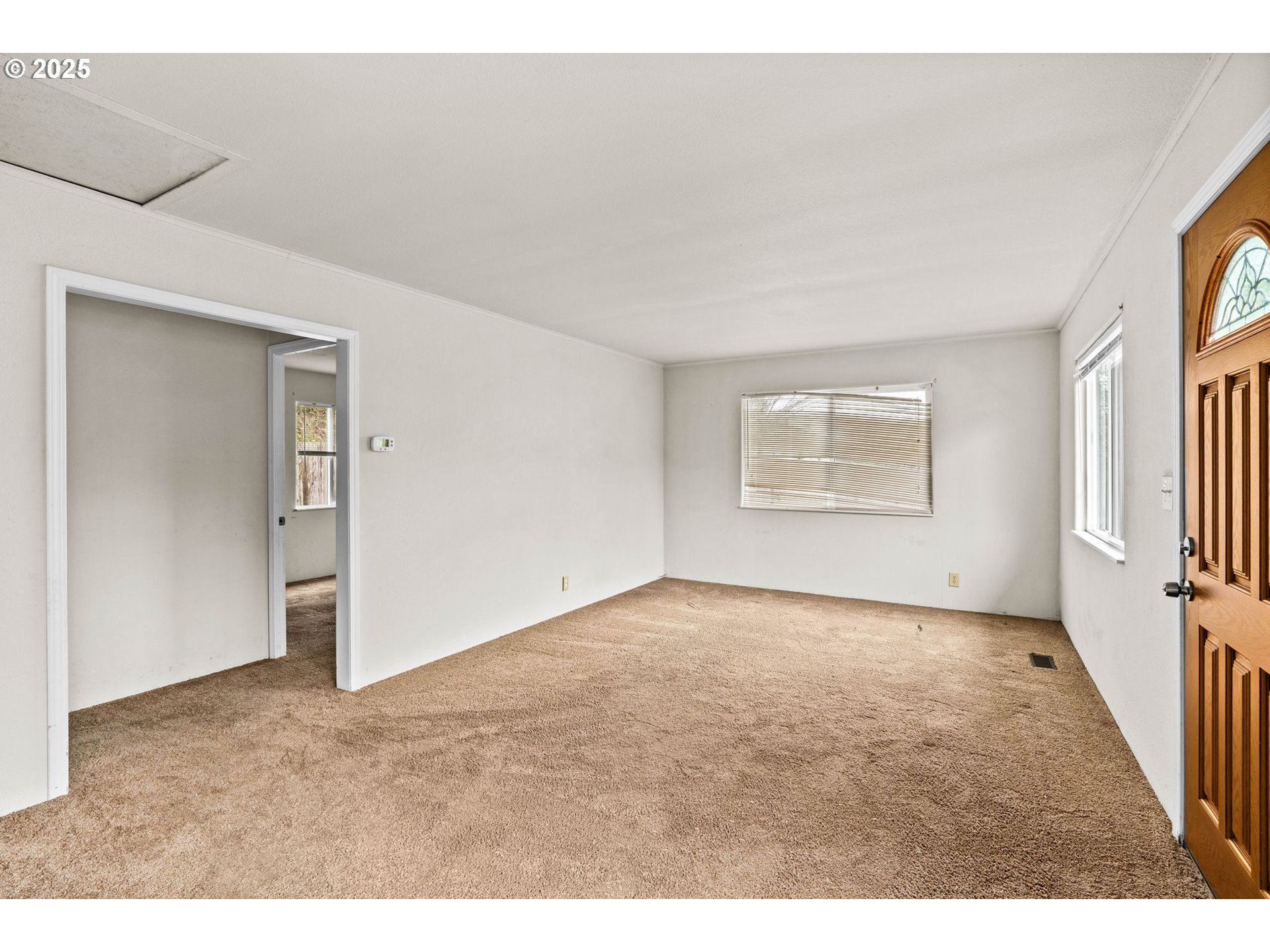 1389 Northeast Brooklyn Avenue Roseburg, OR 97470 - Photo 13 of 19 a view of an empty room with a window