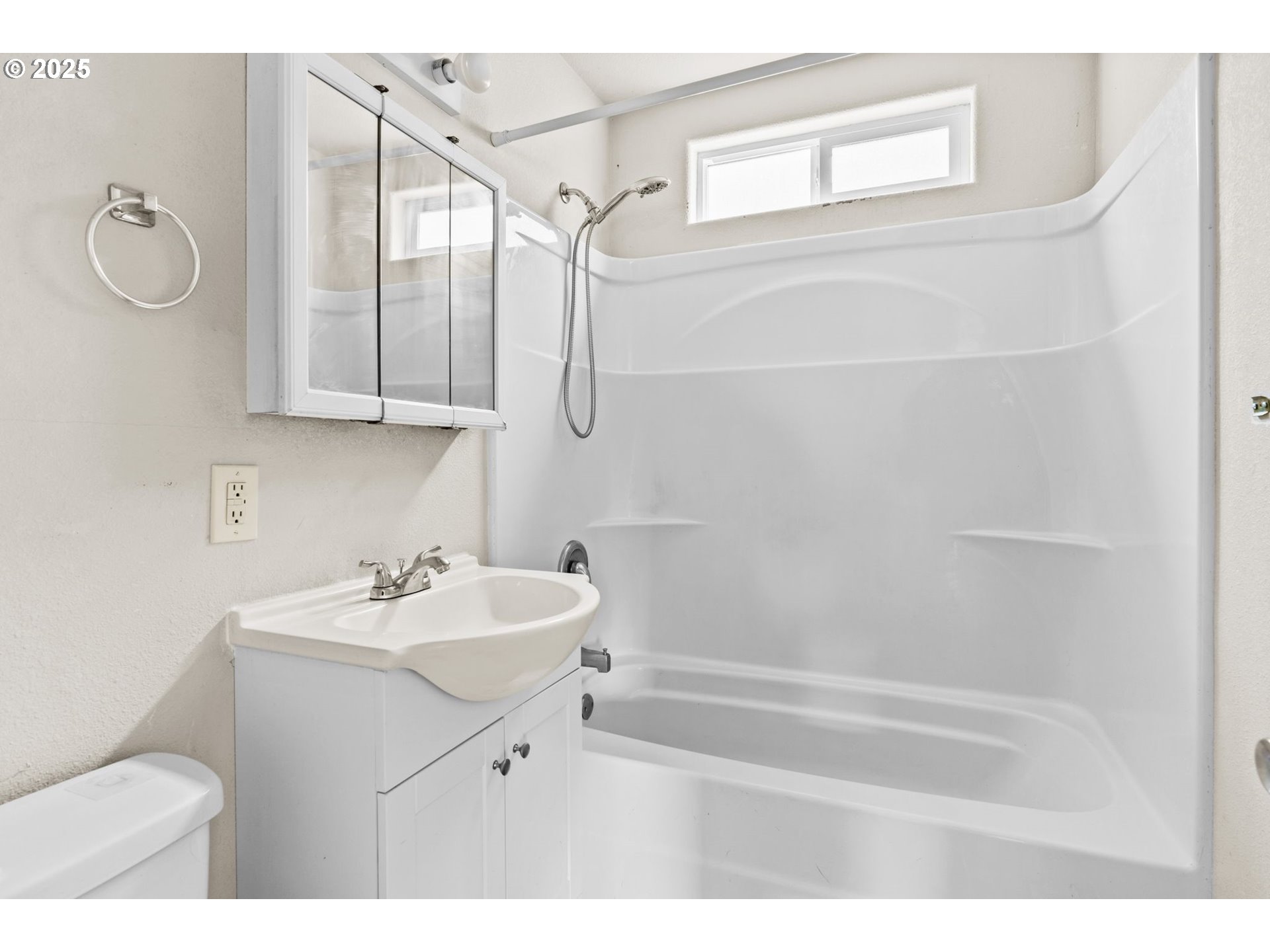 1389 Northeast Brooklyn Avenue Roseburg, OR 97470 - Photo 14 of 19 a bathroom with a sink a toilet and a mirror