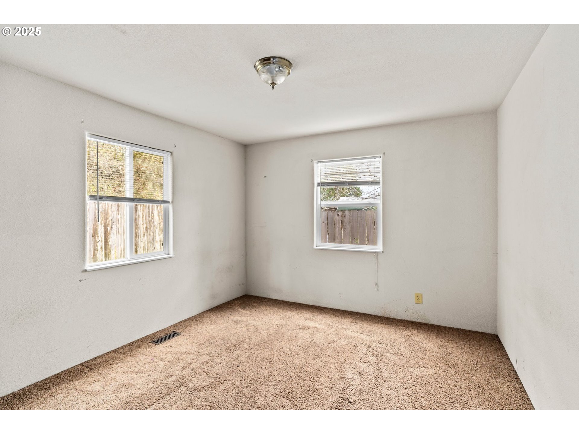 1389 Northeast Brooklyn Avenue Roseburg, OR 97470 - Photo 15 of 19 a view of an empty room with a window