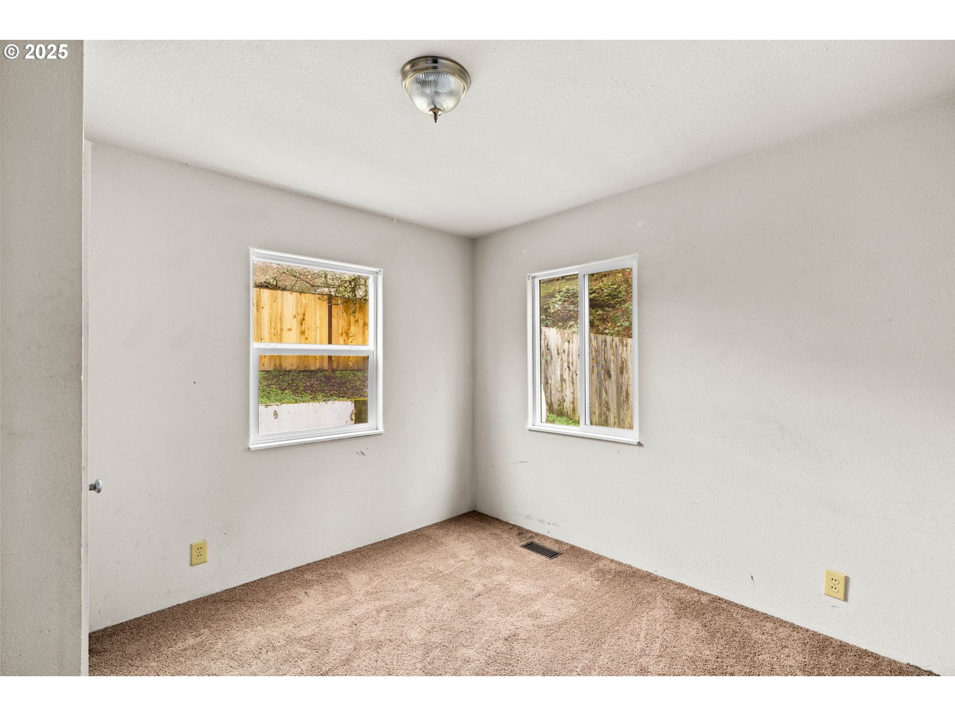 1389 Northeast Brooklyn Avenue Roseburg, OR 97470 - Photo 17 of 19 a view of an empty room with a window