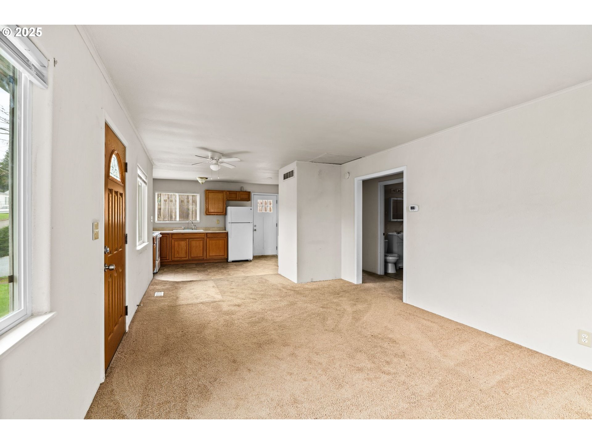 1389 Northeast Brooklyn Avenue Roseburg, OR 97470 - Photo 7 of 19 a view of empty room with floor to ceiling window