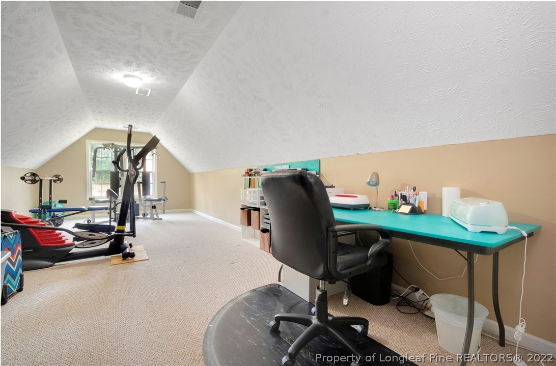 274 Deaton Road Raeford, NC 28376 - Photo 32 of 49 a view of a workspace with gym equipment
