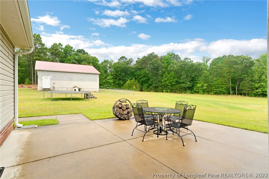 274 Deaton Road Raeford, NC 28376 - Photo 36 of 49 a view of yard with seating area