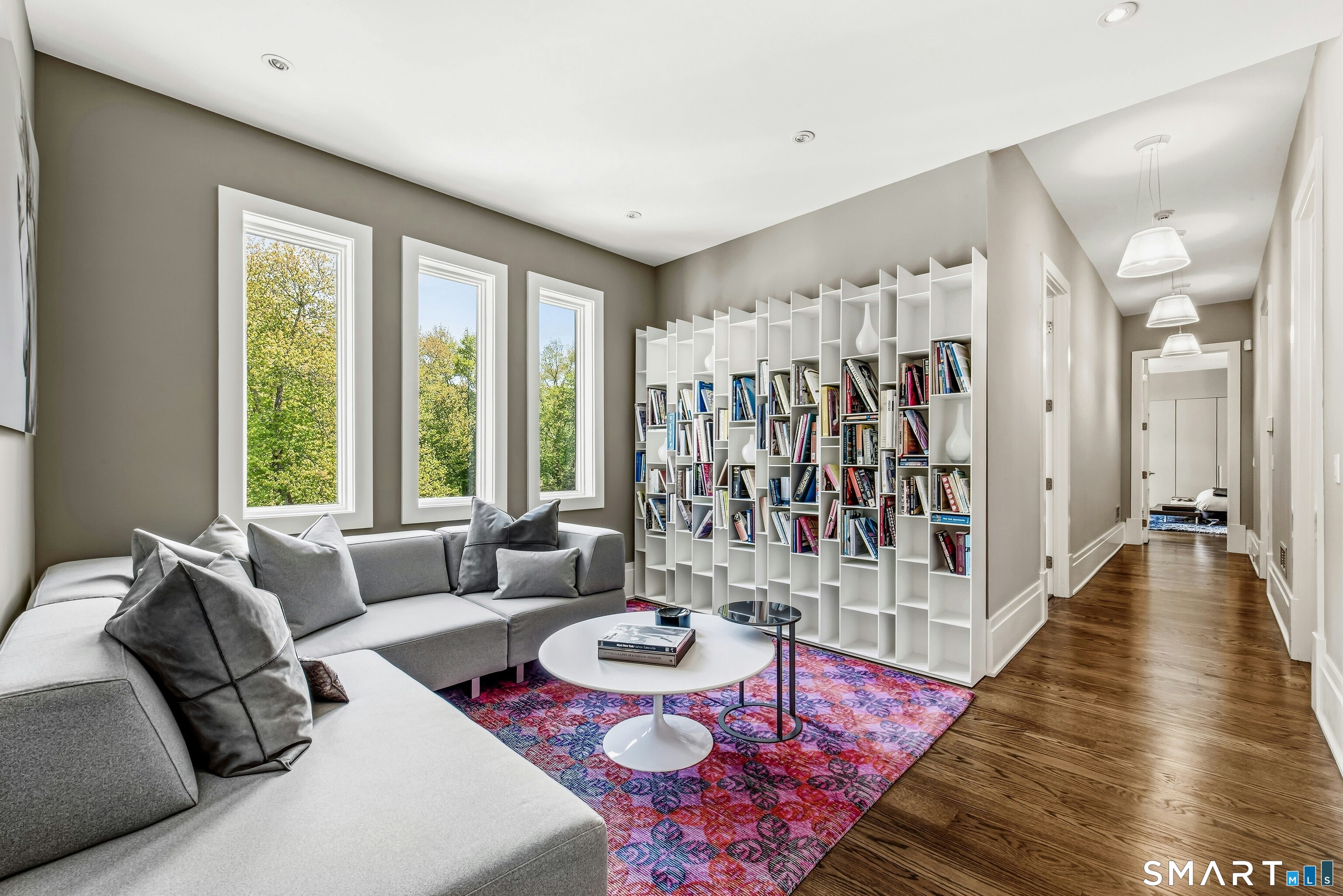 300 Sturges Ridge Road Wilton, CT 06897 - Photo 25 of 40 a living room with furniture and a large window