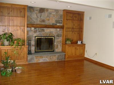1087 State Park Road Wind Gap, PA 18091 - Photo 8 of 32 a living room with a fireplace