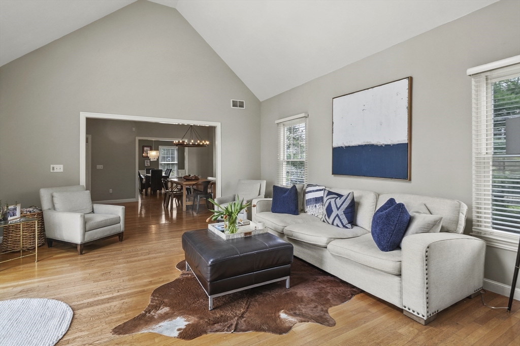 12 Peach Tree Drive Sutton, MA 01590 - Photo 12 of 37 a living room with furniture and a wooden floor
