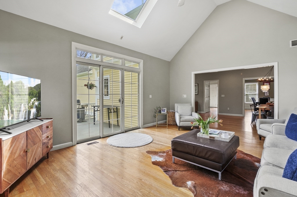 12 Peach Tree Drive Sutton, MA 01590 - Photo 13 of 37 a living room with furniture and a flat screen tv