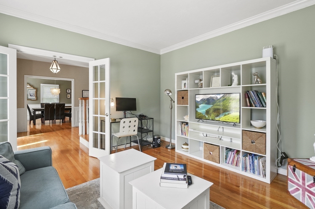 12 Peach Tree Drive Sutton, MA 01590 - Photo 14 of 37 a living room with fireplace furniture and a flat screen tv