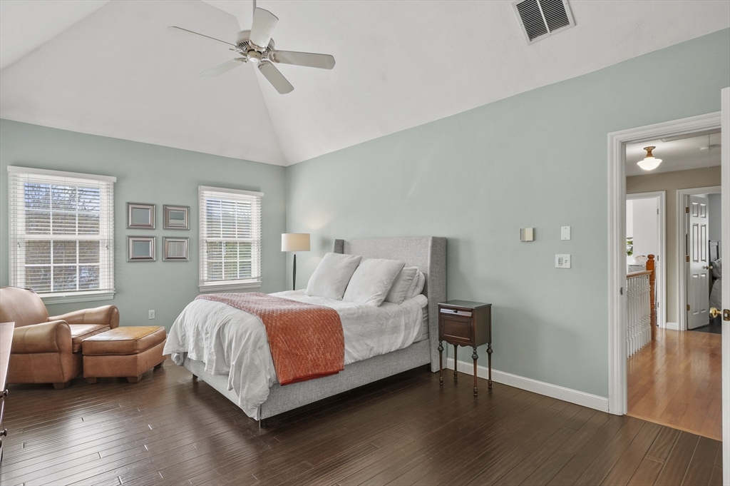 12 Peach Tree Drive Sutton, MA 01590 - Photo 17 of 37 a bedroom with a bed and wooden floor