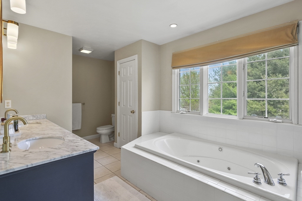 12 Peach Tree Drive Sutton, MA 01590 - Photo 20 of 37 a bathroom with a bathtub and a sink