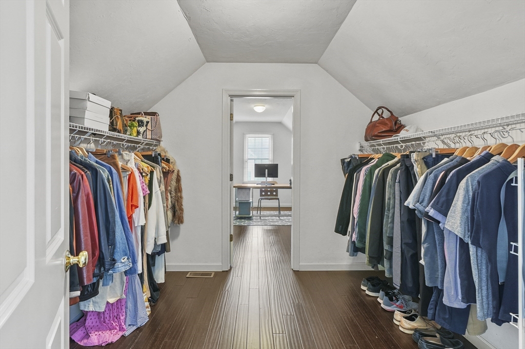 12 Peach Tree Drive Sutton, MA 01590 - Photo 21 of 37 a view of walk in closet with clothes and shoes
