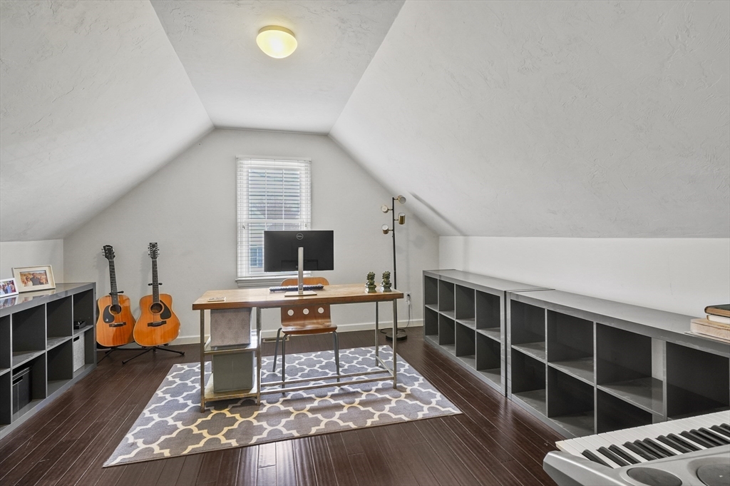 12 Peach Tree Drive Sutton, MA 01590 - Photo 22 of 37 a living room with furniture and a flat screen tv