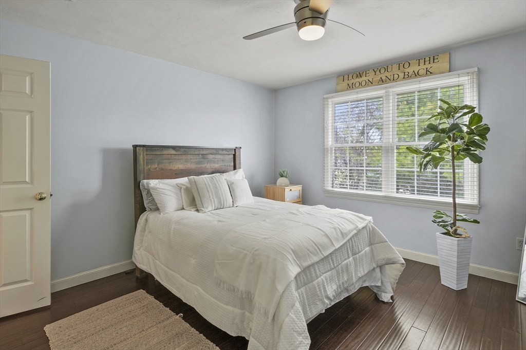 12 Peach Tree Drive Sutton, MA 01590 - Photo 25 of 37 a bed sitting in a bedroom next to a window