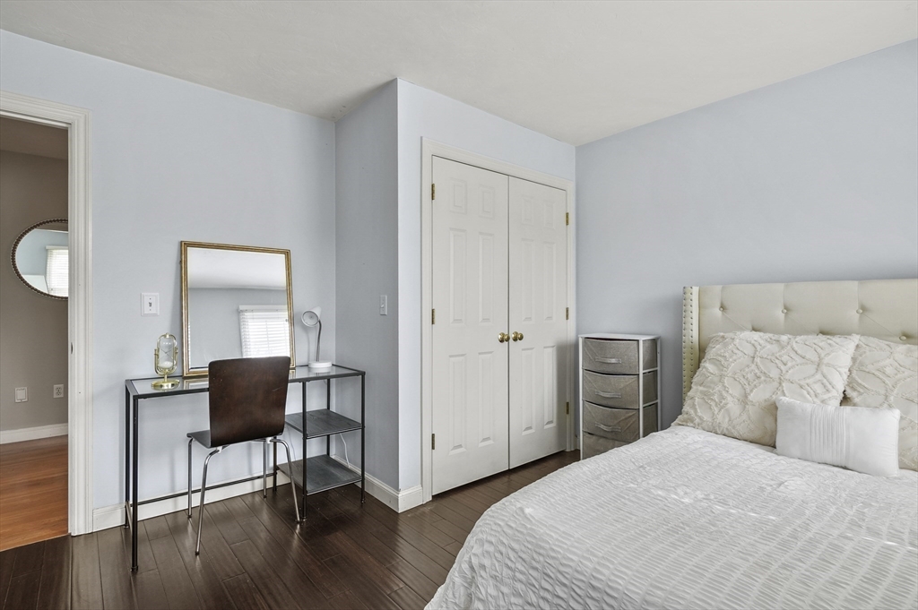 12 Peach Tree Drive Sutton, MA 01590 - Photo 29 of 37 a bedroom with a bed and a chair