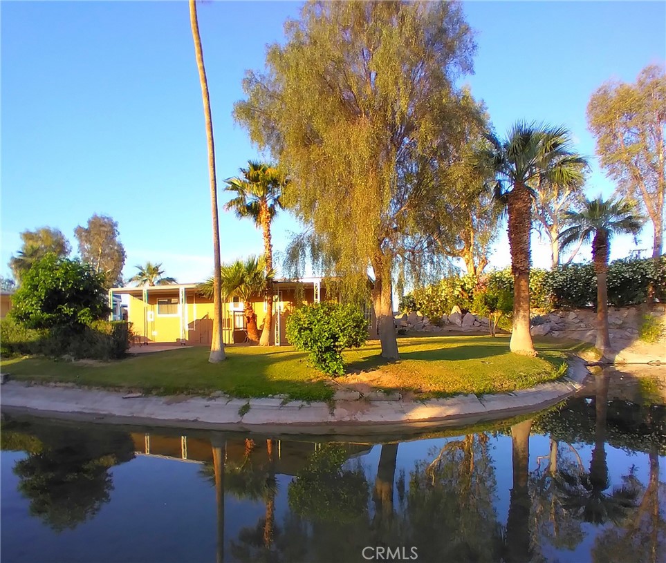 698 Channel Way Needles, CA 92363 - Photo 1 of 1 a view of swimming pool with an outdoor space and seating area