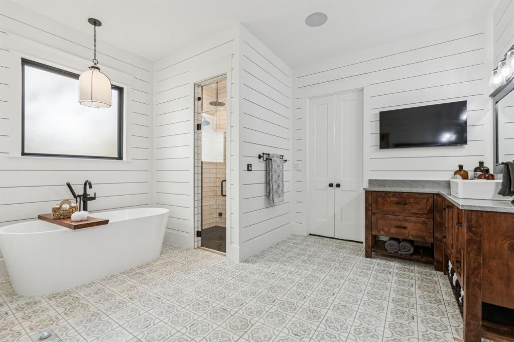 2577 Lone Star Road Celina, TX 75009 - Photo 11 of 40 a living room with furniture and a flat screen tv