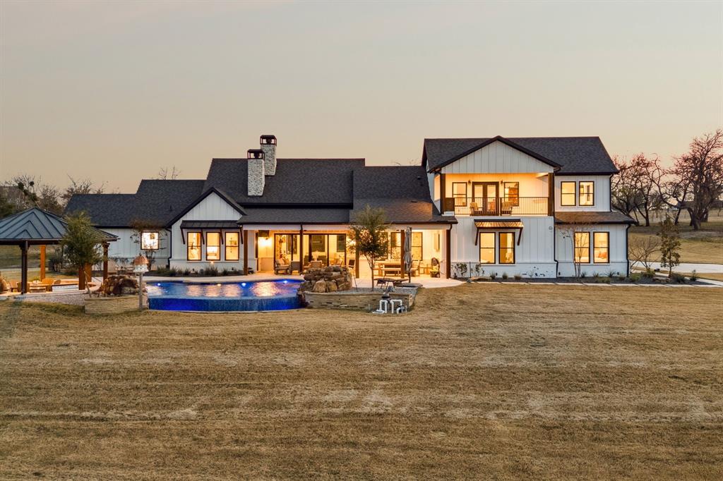 2577 Lone Star Road Celina, TX 75009 - Photo 2 of 40 a view of a house with large outdoor space and sitting area
