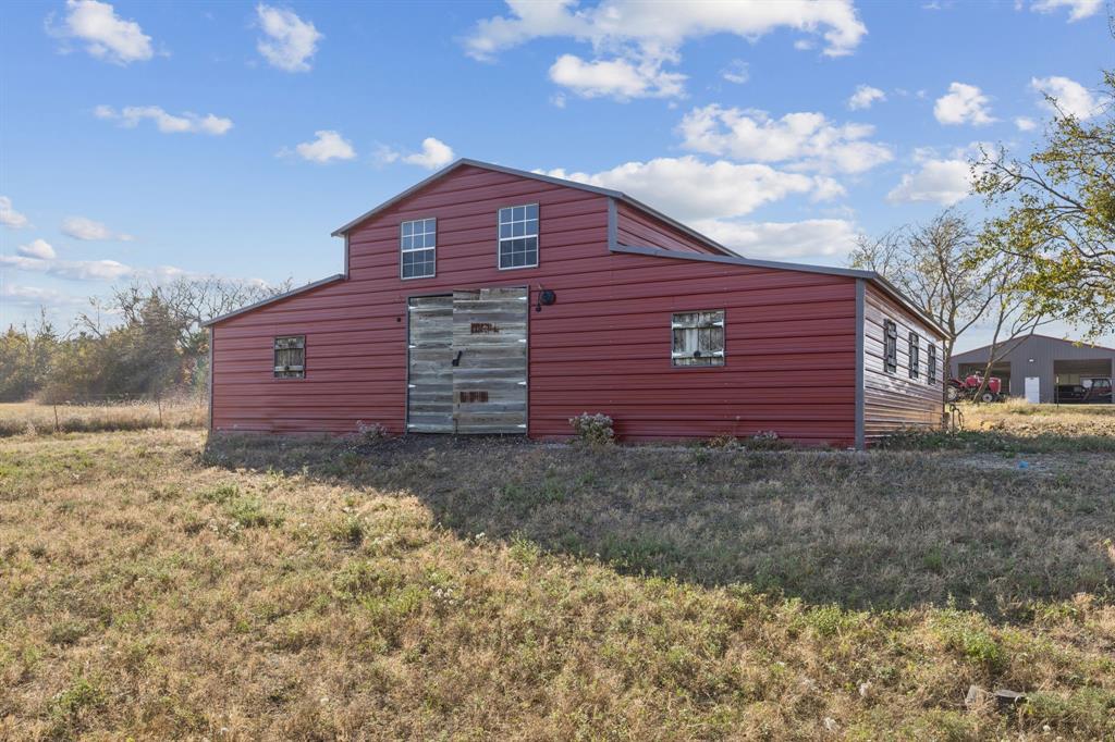 2577 Lone Star Road Celina, TX 75009 - Photo 31 of 40 a backyard of a house