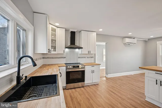 a view of kitchen and wooden floor