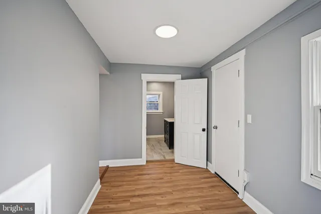 a view of entryway with wooden floor