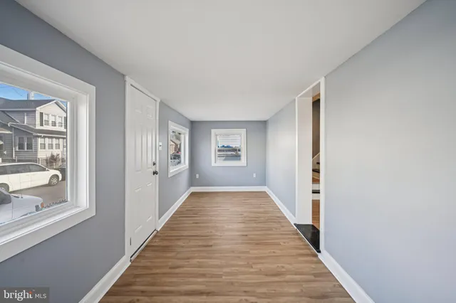 a view of a bathroom with a sink and a window