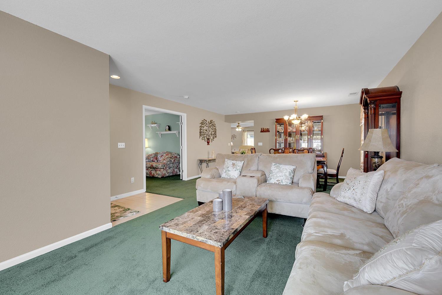 9840 Ellis Way Live Oak, CA 95953 - Photo 8 of 44 a living room with furniture and a table