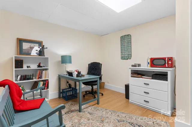 a view of a workspace with furniture