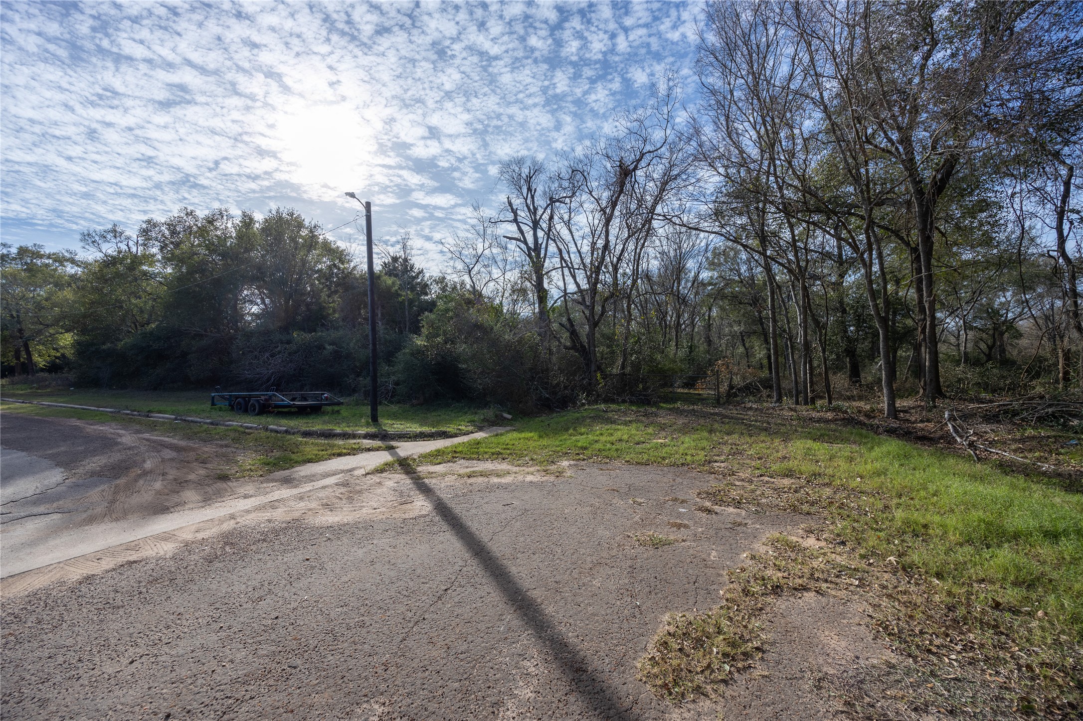 7 Baker Street Hempstead, TX 77445 - Photo 10 of 14 a backyard of a house with lots of green space