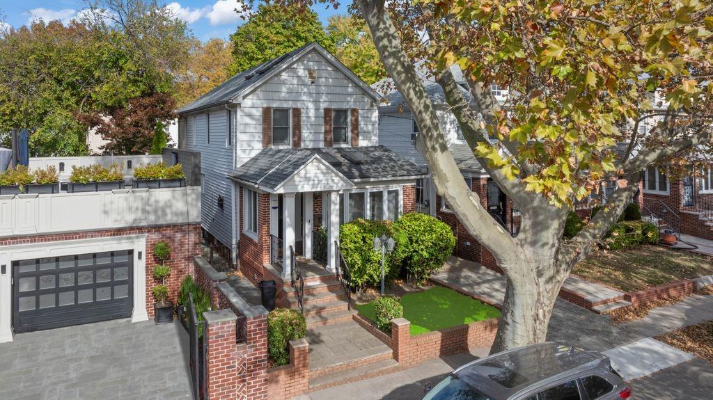 43 78th Street Brooklyn, NY 11209 - Photo 26 of 33 a front view of a house with garden