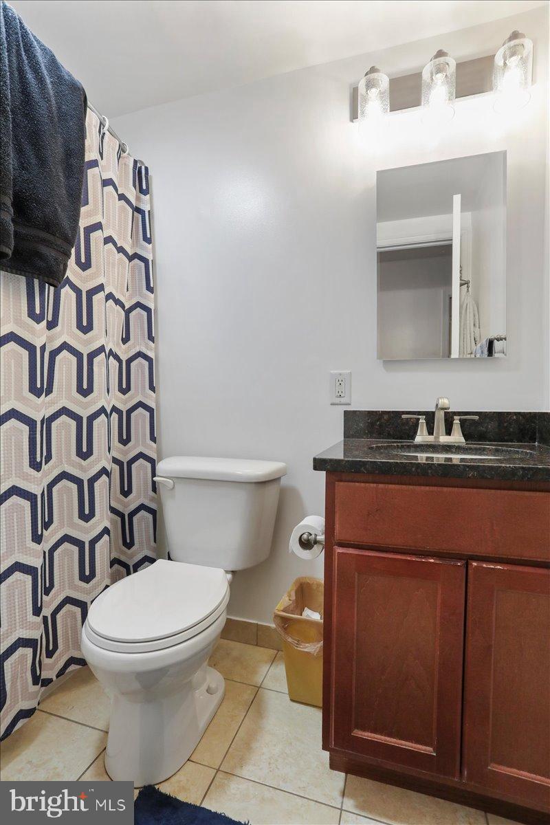 501 Prospect Boulevard Frederick, MD 21701 - Photo 9 of 27 a bathroom with a toilet and a sink